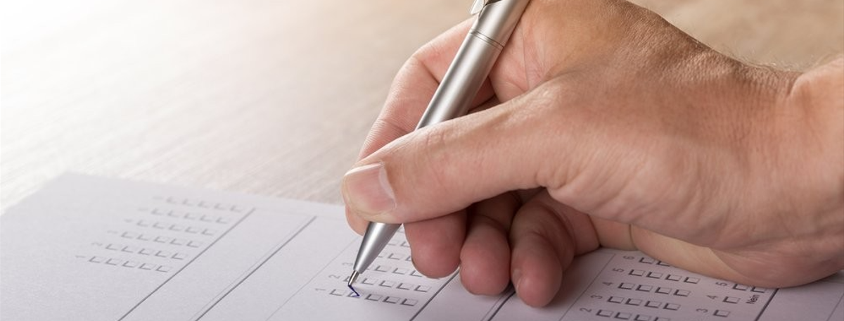 Person completing an online mental health test on a smartphone — private, accessible mental health screening in Nigeria