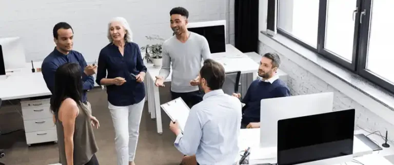 Manager listening supportively to employee during workplace trauma recovery discussion
